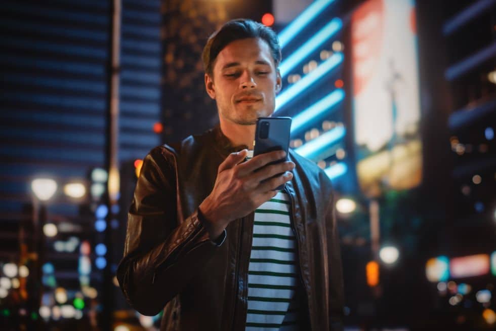 a man holding a phone